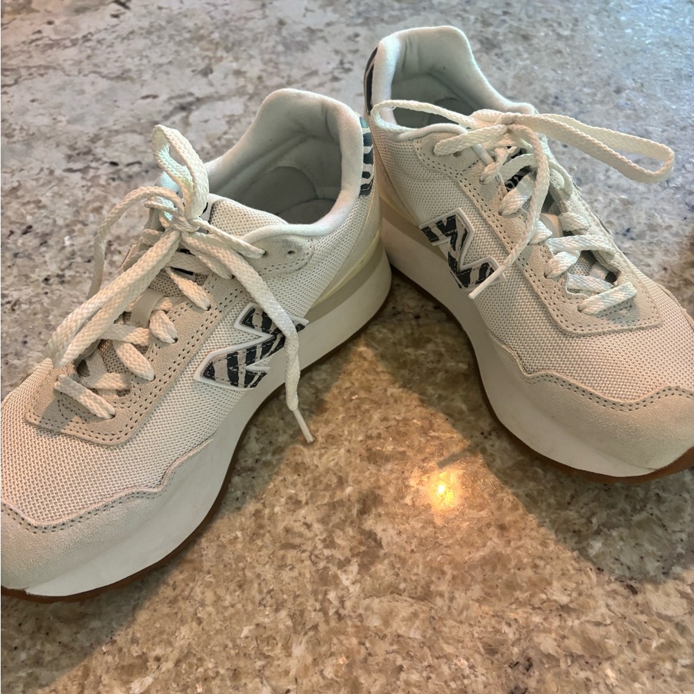 New Balance White Sneakers with Black Details